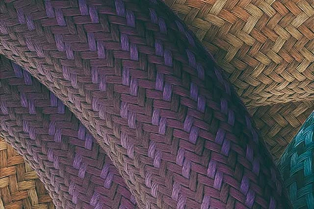 Close-up van het textieloppervlak van het YARNIT-kettingslot © ABUS