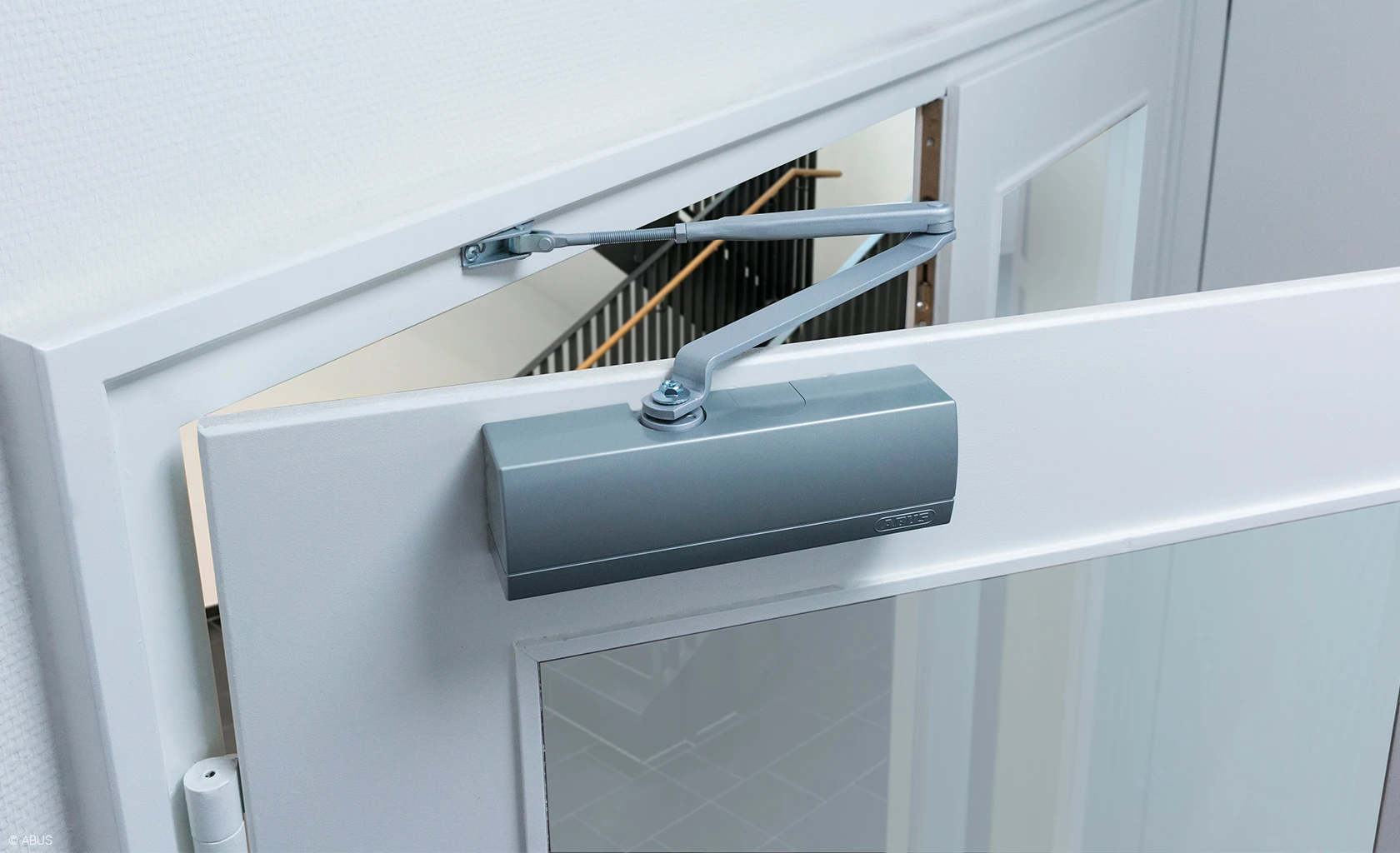 Close doors quietly and securely - with door closers from ABUS © ABUS