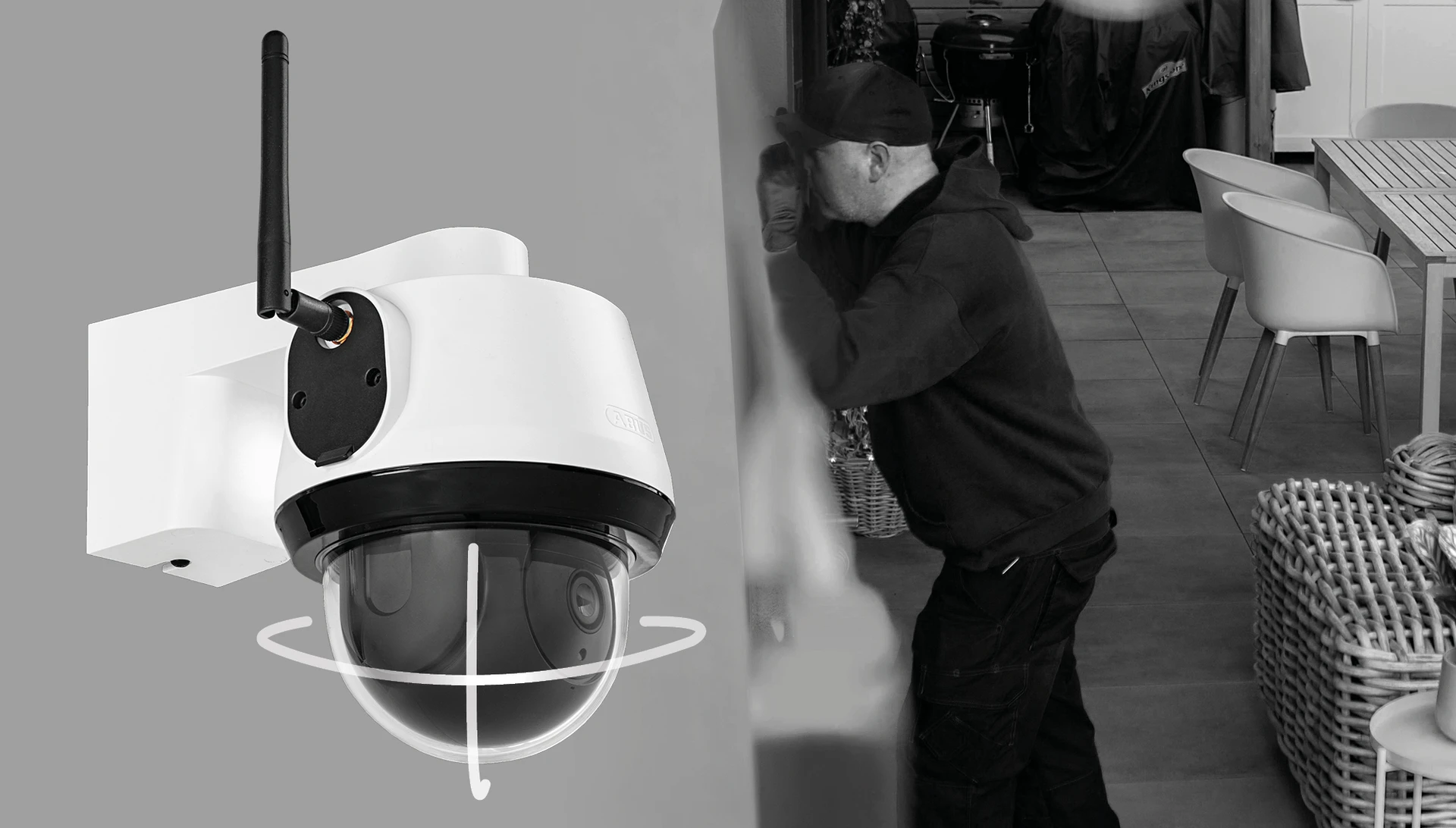 Die ABUS SmartLook Schwenken & Neigen Kamera in einem schwarz weißem Bild mit einem Dieb © ABUS