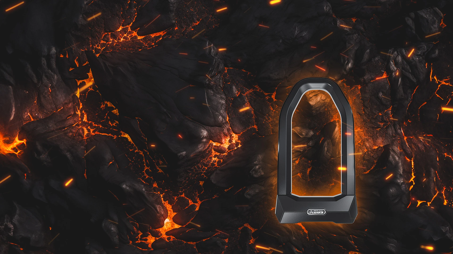 L'antivol U GRANIT Super Extreme 2500 sur un fond sombre de lave et de roche de lave. ©ABUS