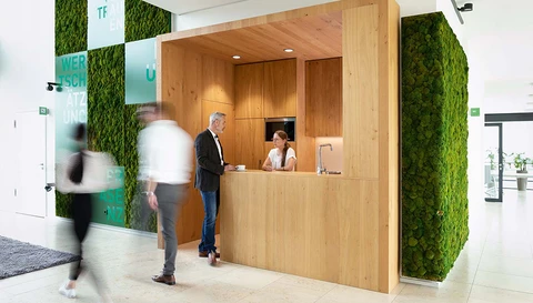 The entrance of a boutique hotel, welcoming guests with elegance and charm