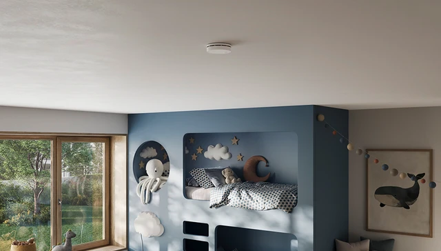 Children's room with PREFIRA 5 smoke detector on the ceiling © ABUS