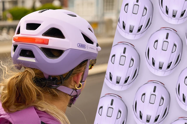 Productafbeelding van de fietshelm Urban-I 4.0 in light lavender naast een echte foto van de helm gezien van achteren © ABUS